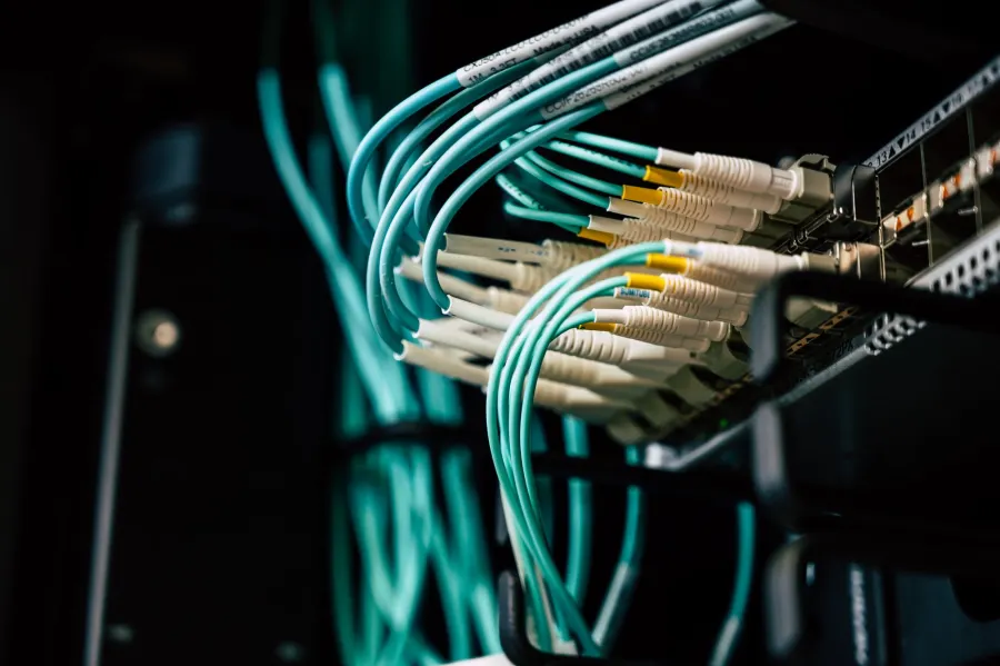 Fiber connections in a server rack, photographed by Brett Sayles.